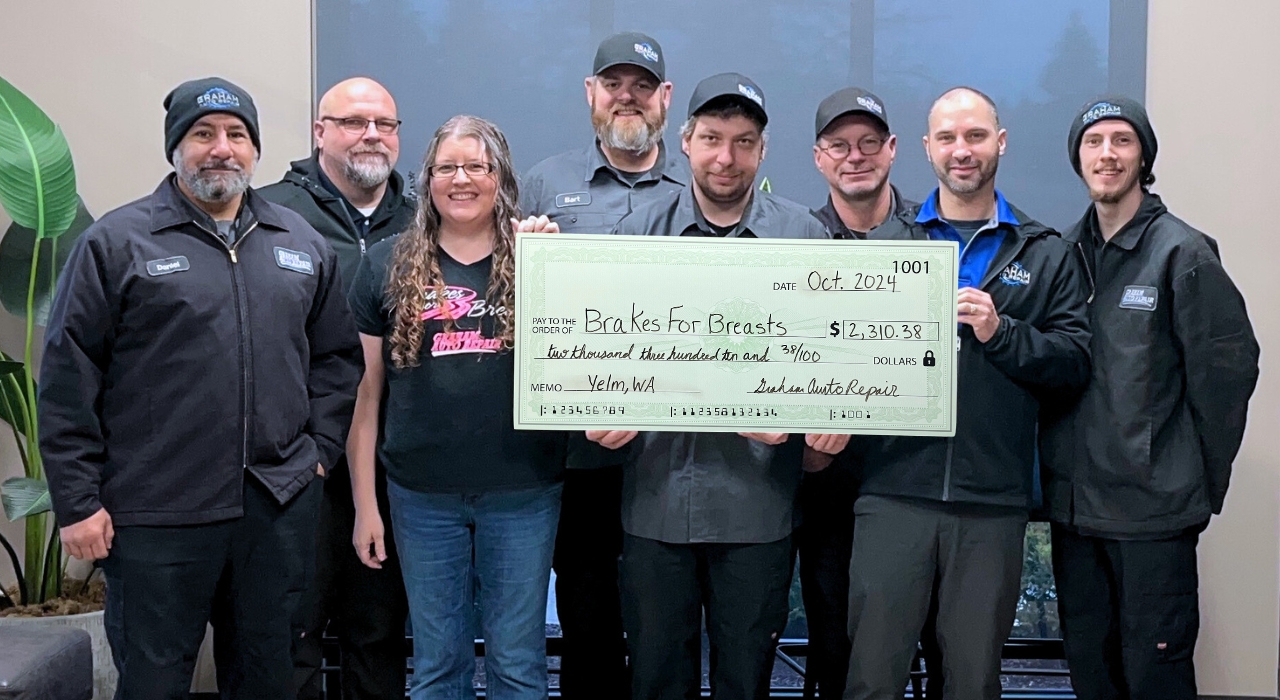 Brakes for Breasts in Yelm, WA - Our Graham Auto Repair Team holding the donation check in 2024